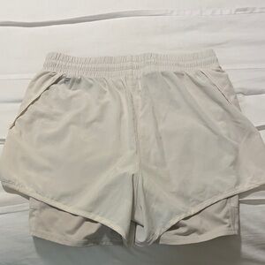 Fabletics women’s 2 in one Light Beige Athletic Shorts